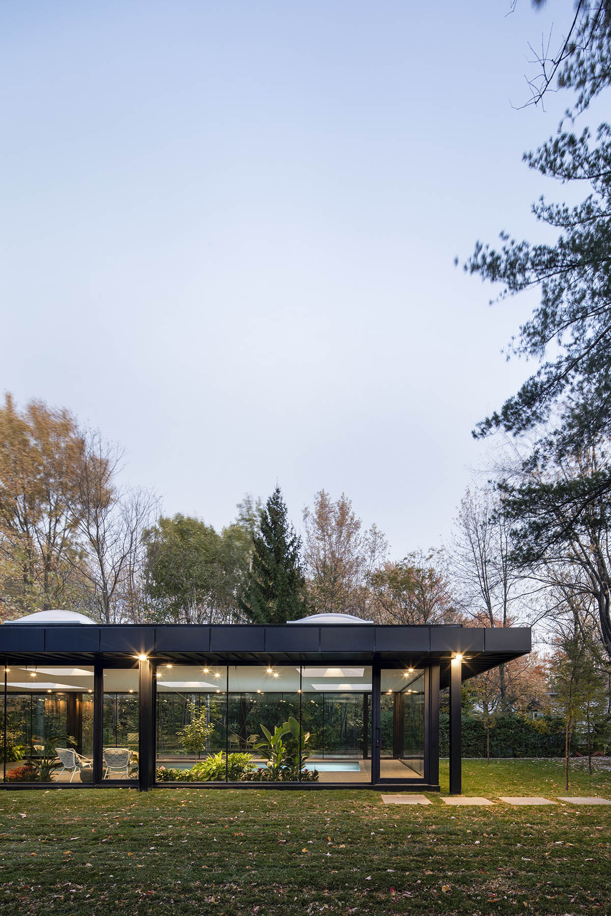 Maurice Martel architecte's pavilion with dark roof is