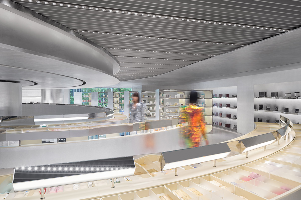 Various Associates designs beauty store with winding staircase and silver-toned interiors in Hangzhou