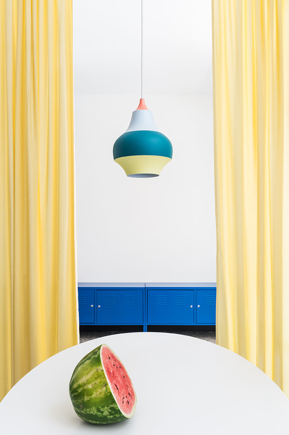 La Macchina Studio revives old apartment with theatrical and colorful interiors in Rome