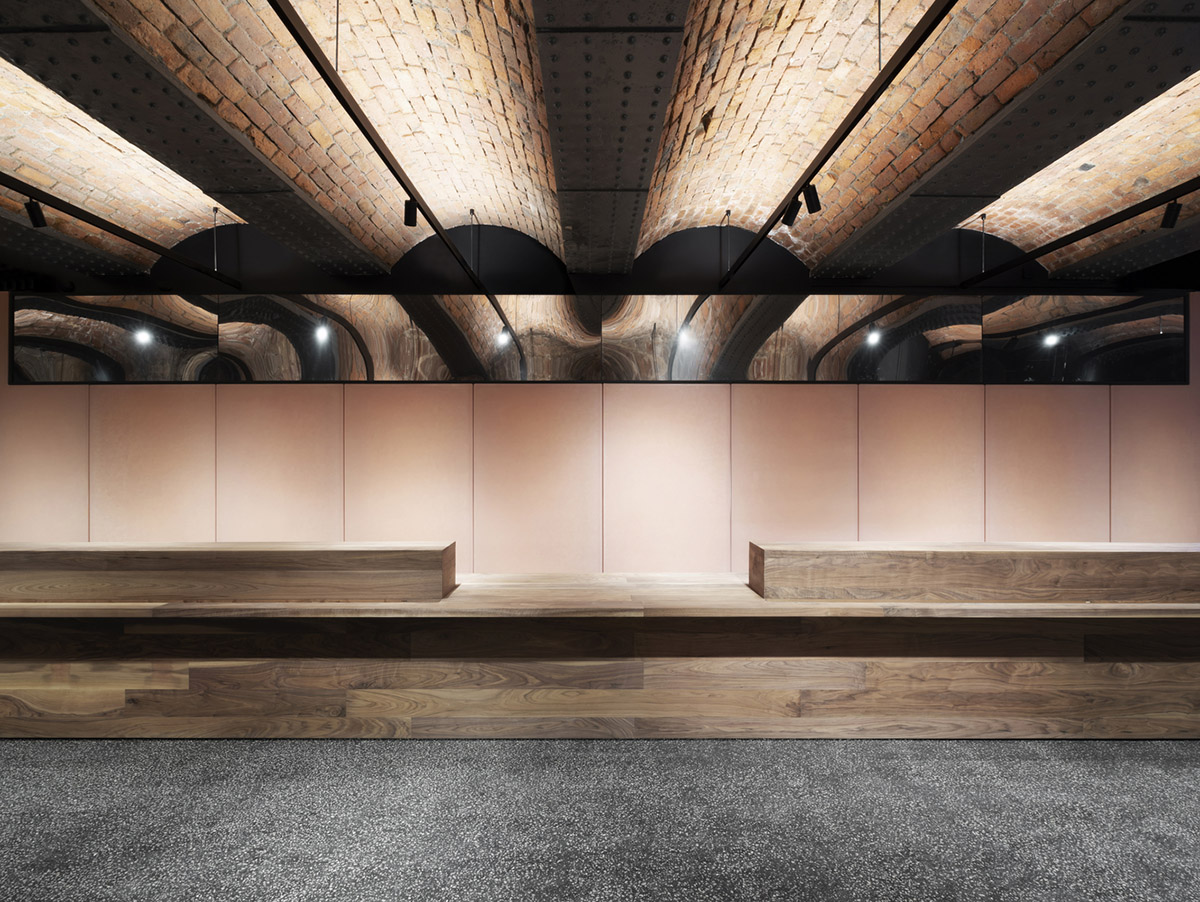 Carmody Groarke completes gallery that features brick vaulted ceilings and back-lit panels