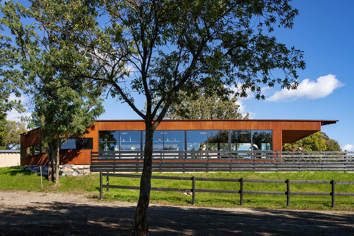 Corten steel artist's studio by Birdseye is enriched by light-filled interior on a valley of Vermont