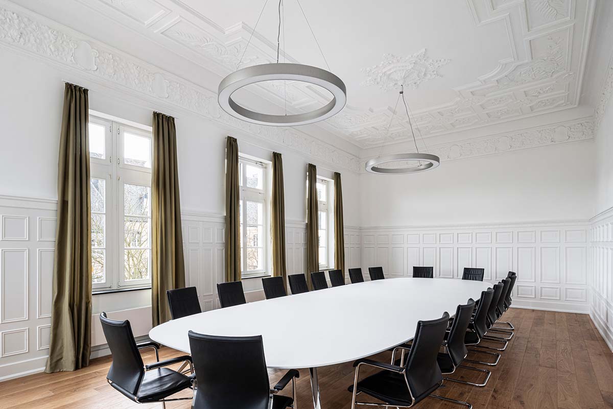 JSWD extends 1960s town hall with interlocking structures and perforated façade in Germany 