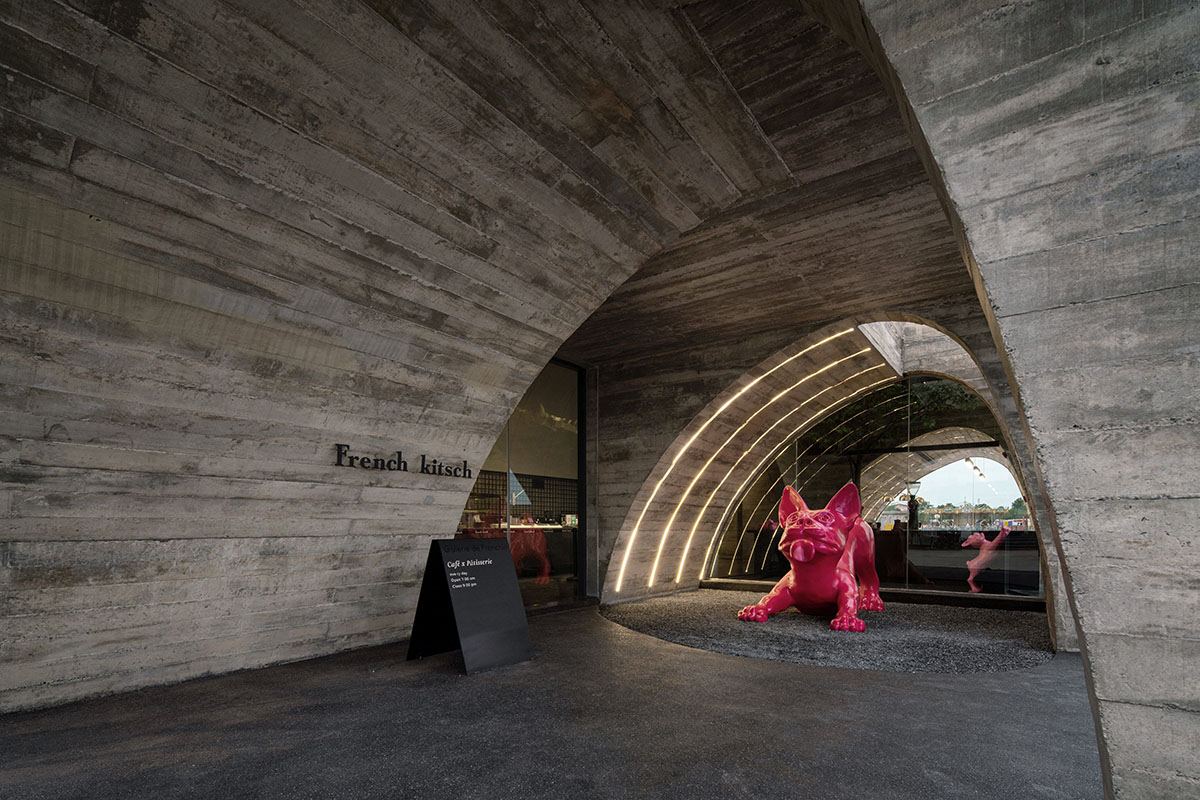 French Kitsch III is a cathedral-like cafe in Thailand that features imperfect arches