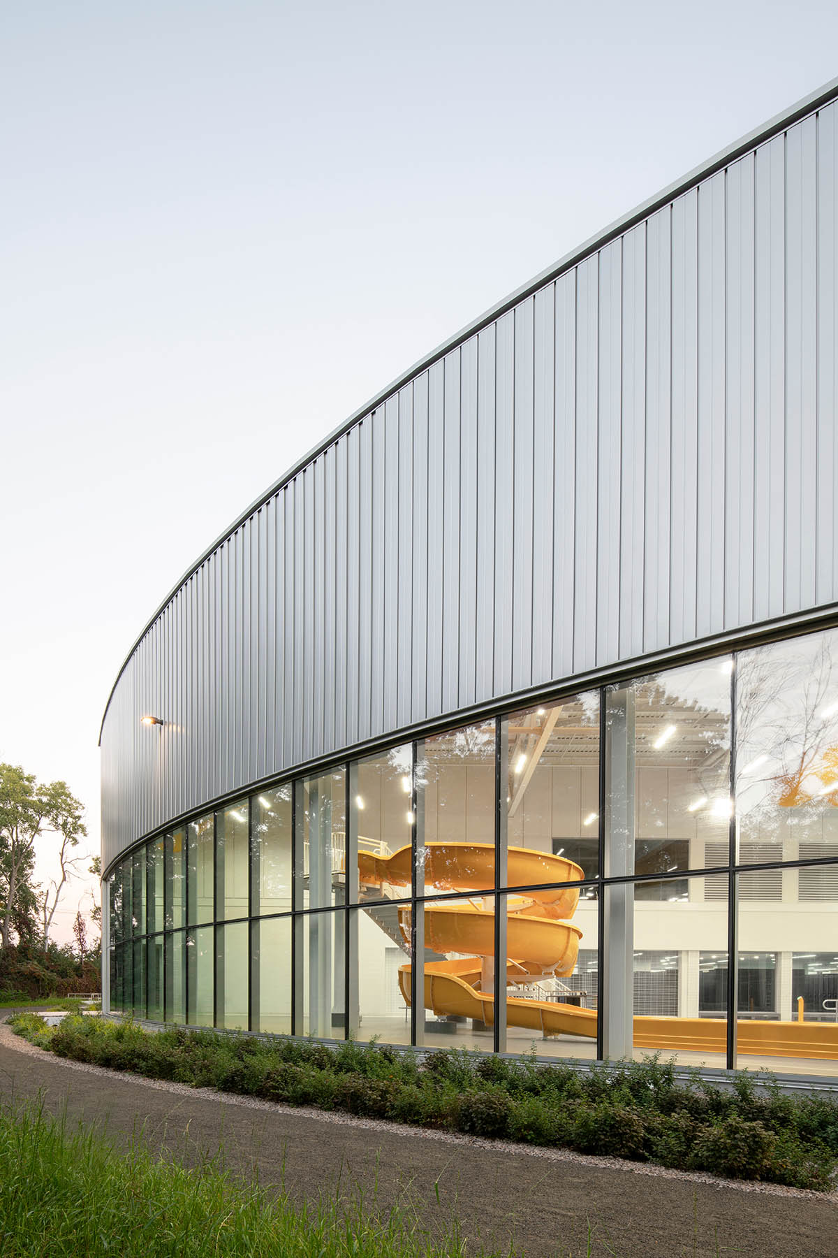 Sid Lee Architecture completes cylindrical aquatic complex in Laval, Canada