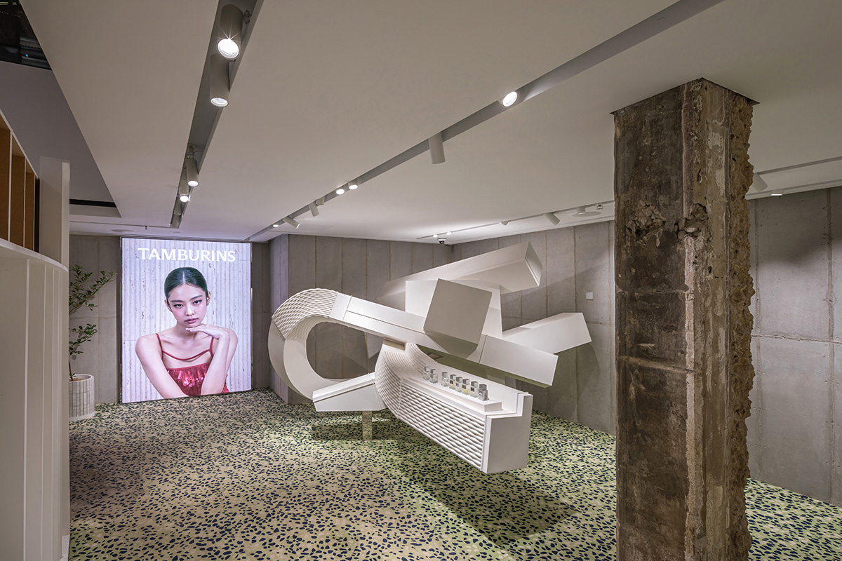 Perfume store by The System Lab shows the beauty of scent with gridded concrete and glass box
