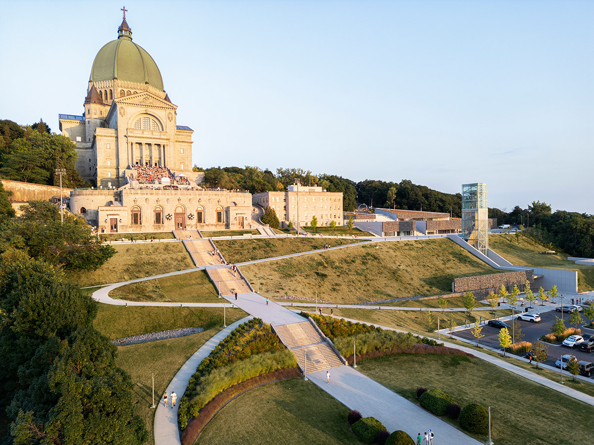 A striking bell tower pierces the sky, illuminating the grandeur of the pavilion in Montreal