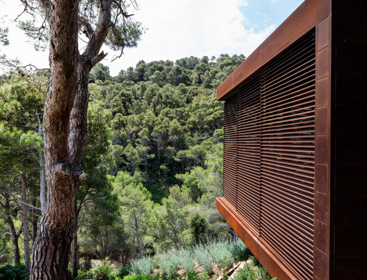 This Is Arquitectura completes corten steel Guest Pavilion in the middle of forest in Spain