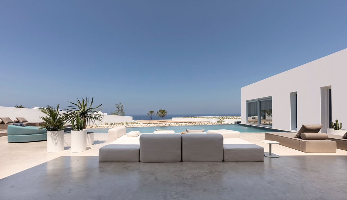 Kapsimalis Architects adds this summer villa featuring orthogonal lines to the Santorini Island