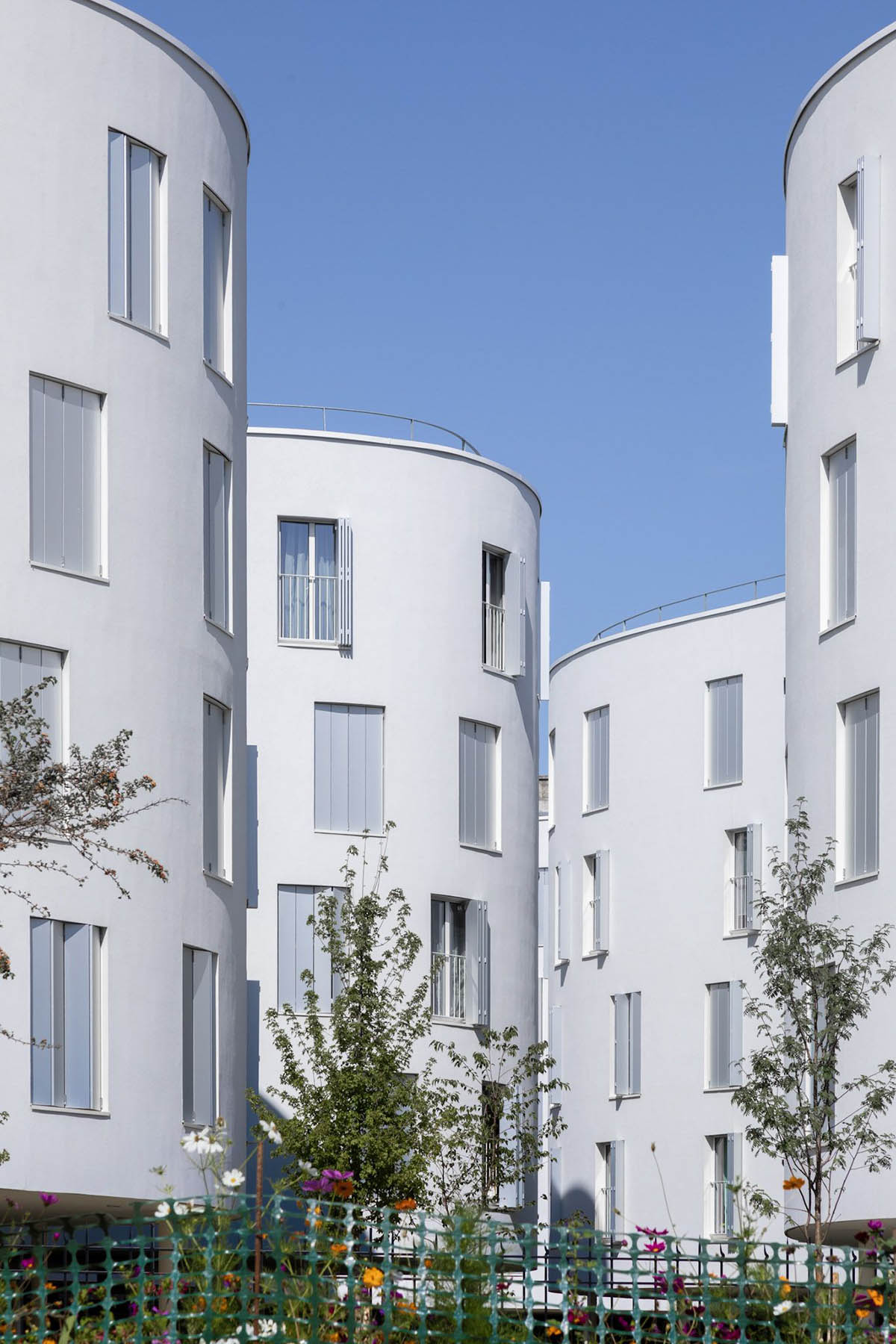 SANAA's social housing complex composed of organic forms in Paris photographed by Vincent Hecht