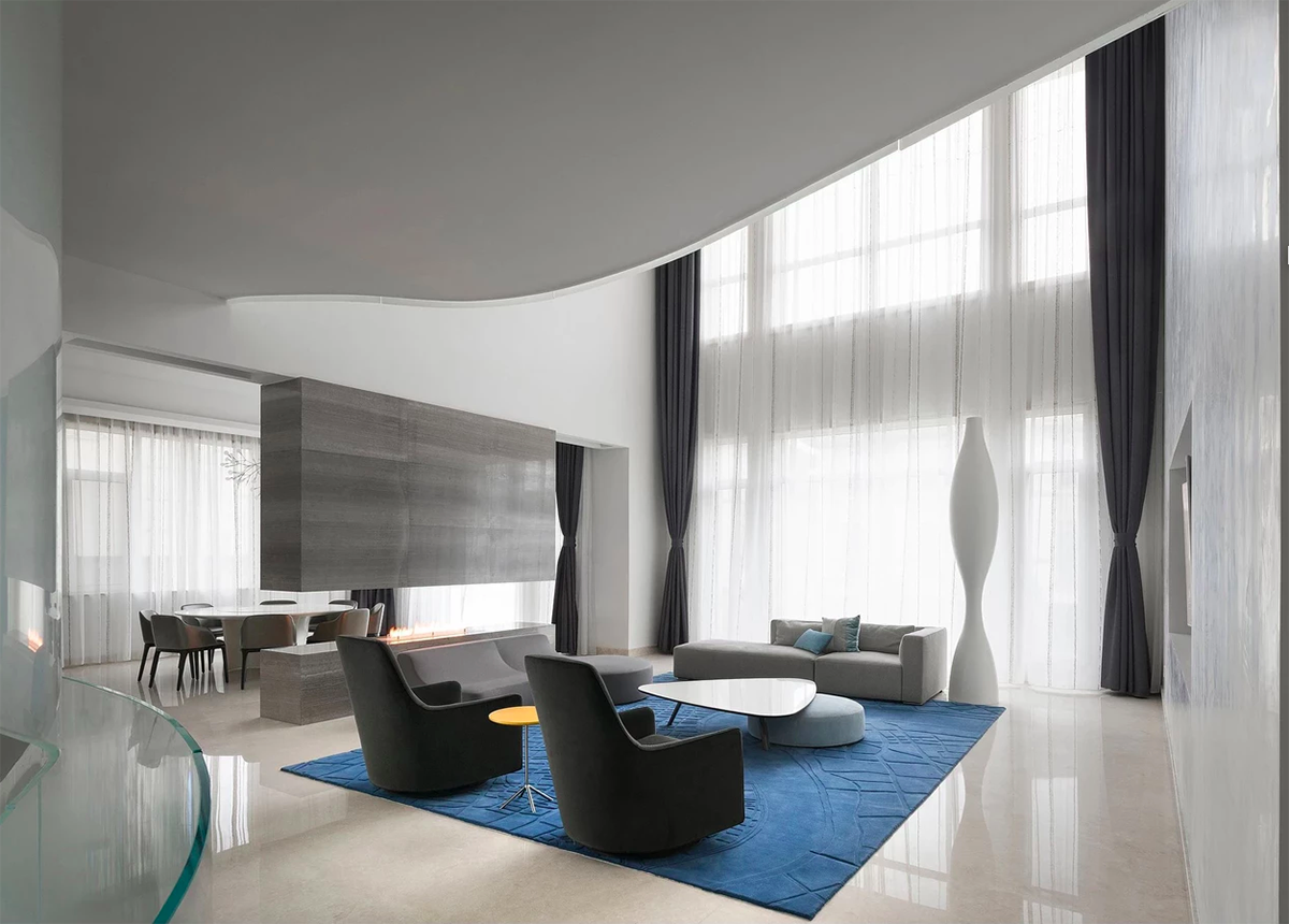 Grand spiral staircase dominates Cloud Villa in Shanghai by KOS Architects