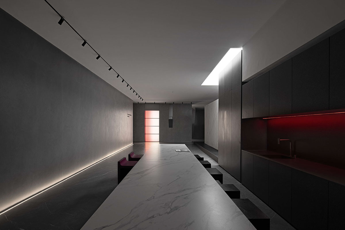AD ARCHITECTURE creates dark interiors for showroom playing with light and sharp geometries in Foshan