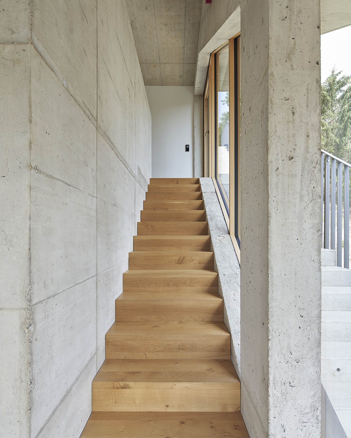 Studio Hertweck designs R&ouml;hrig House with continuous terrace towards the valley in Germany