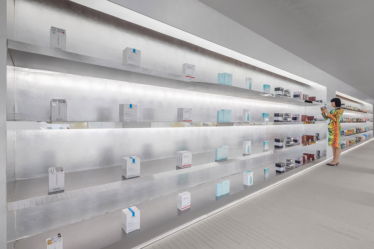 Various Associates designs beauty store with winding staircase and silver-toned interiors in Hangzhou