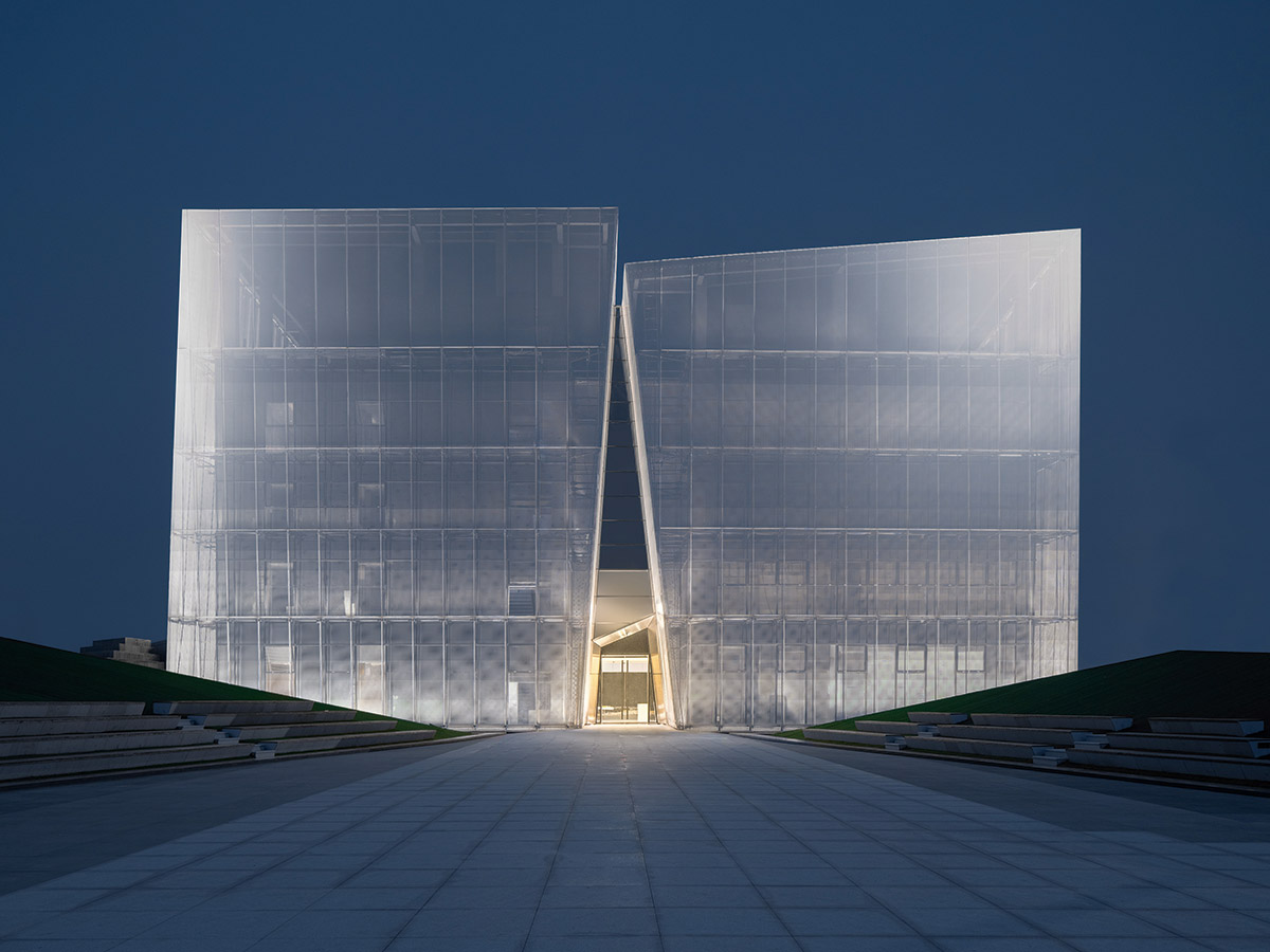 aoe built ShuiFa Info Town Property Exhibition Centre with all-white perforated volumes in China
