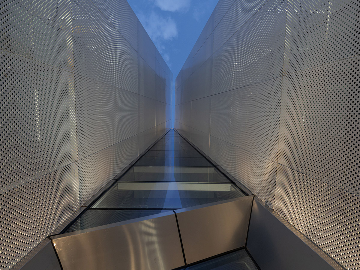 aoe built ShuiFa Info Town Property Exhibition Centre with all-white perforated volumes in China