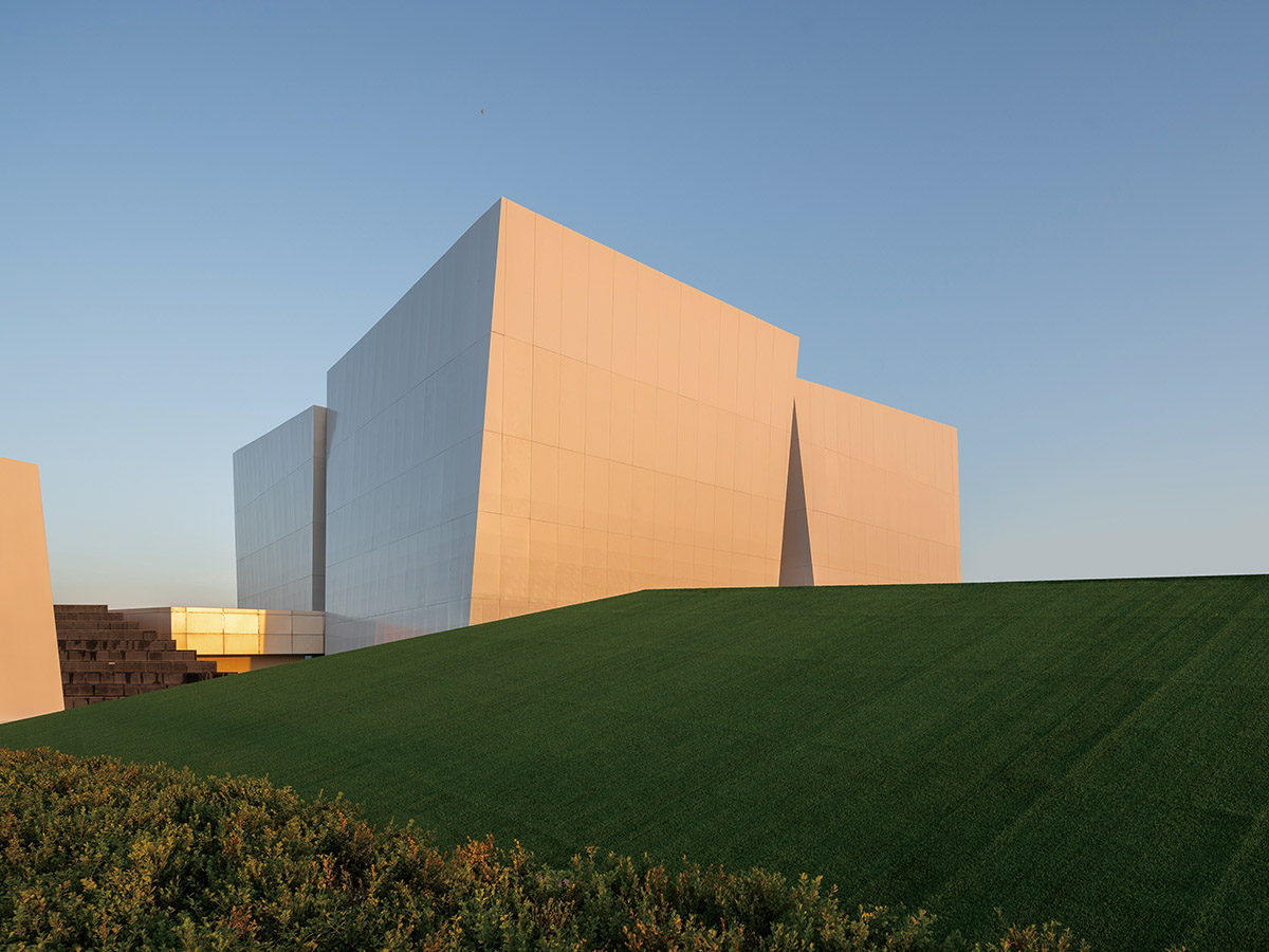 aoe built ShuiFa Info Town Property Exhibition Centre with all-white perforated volumes in China