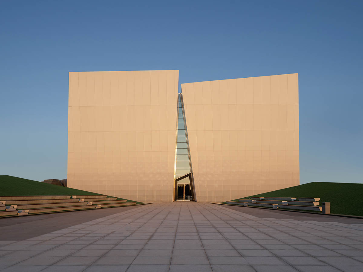 aoe built ShuiFa Info Town Property Exhibition Centre with all-white perforated volumes in China