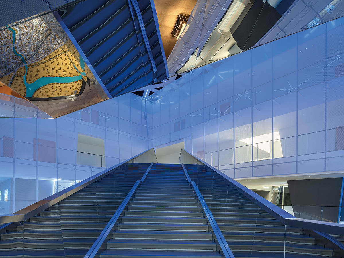 aoe built ShuiFa Info Town Property Exhibition Centre with all-white perforated volumes in China