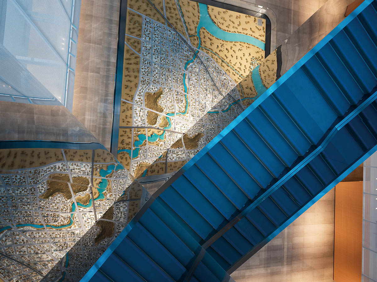 aoe built ShuiFa Info Town Property Exhibition Centre with all-white perforated volumes in China