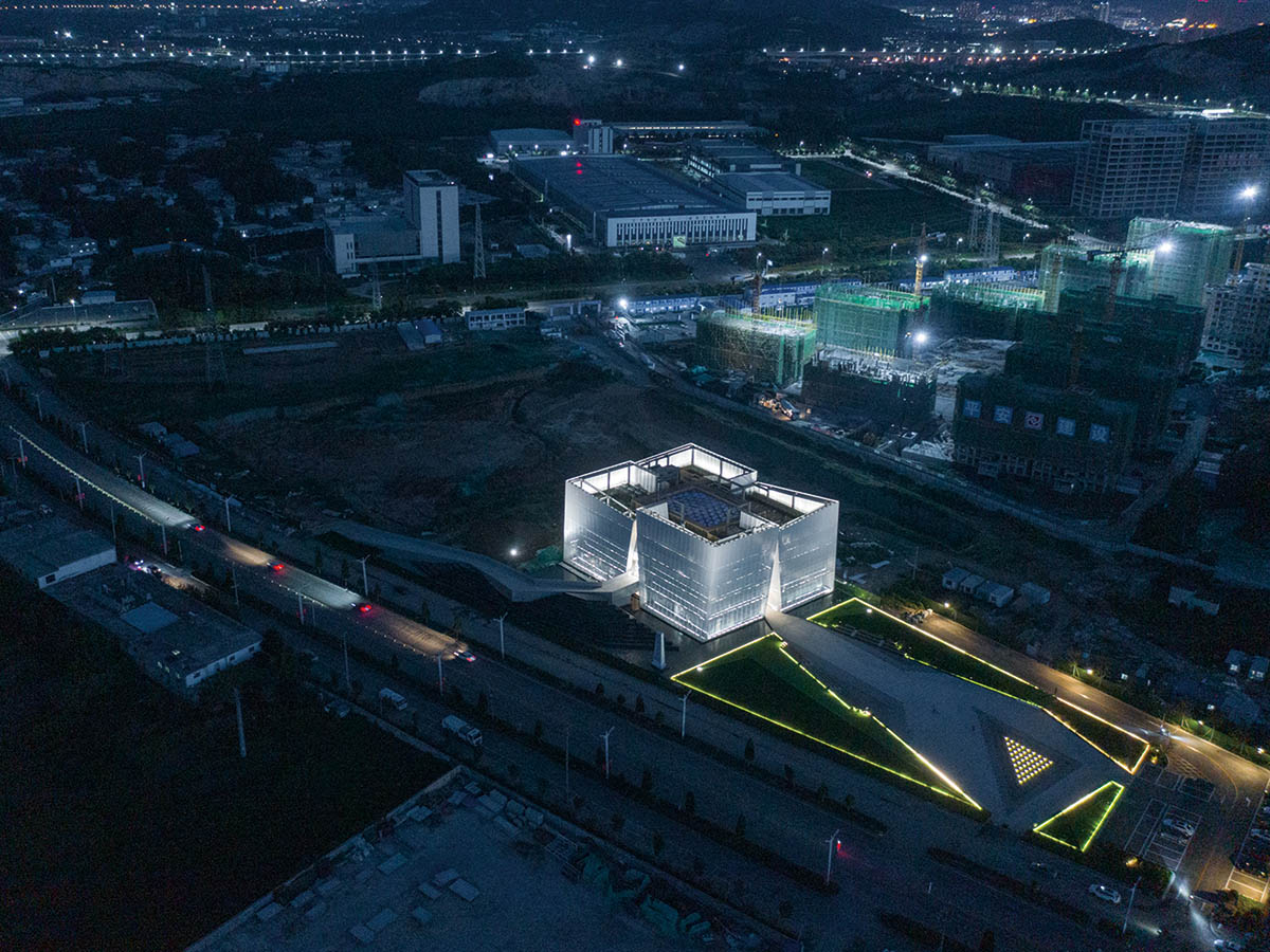 aoe built ShuiFa Info Town Property Exhibition Centre with all-white perforated volumes in China