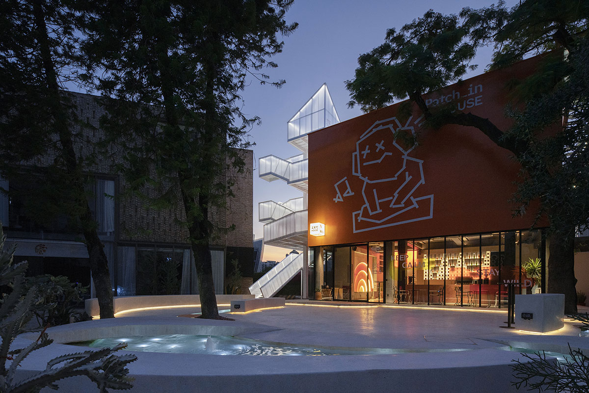 Wutopia Lab completes orange-colored vertical micro social complex with light tower in Guangzhou