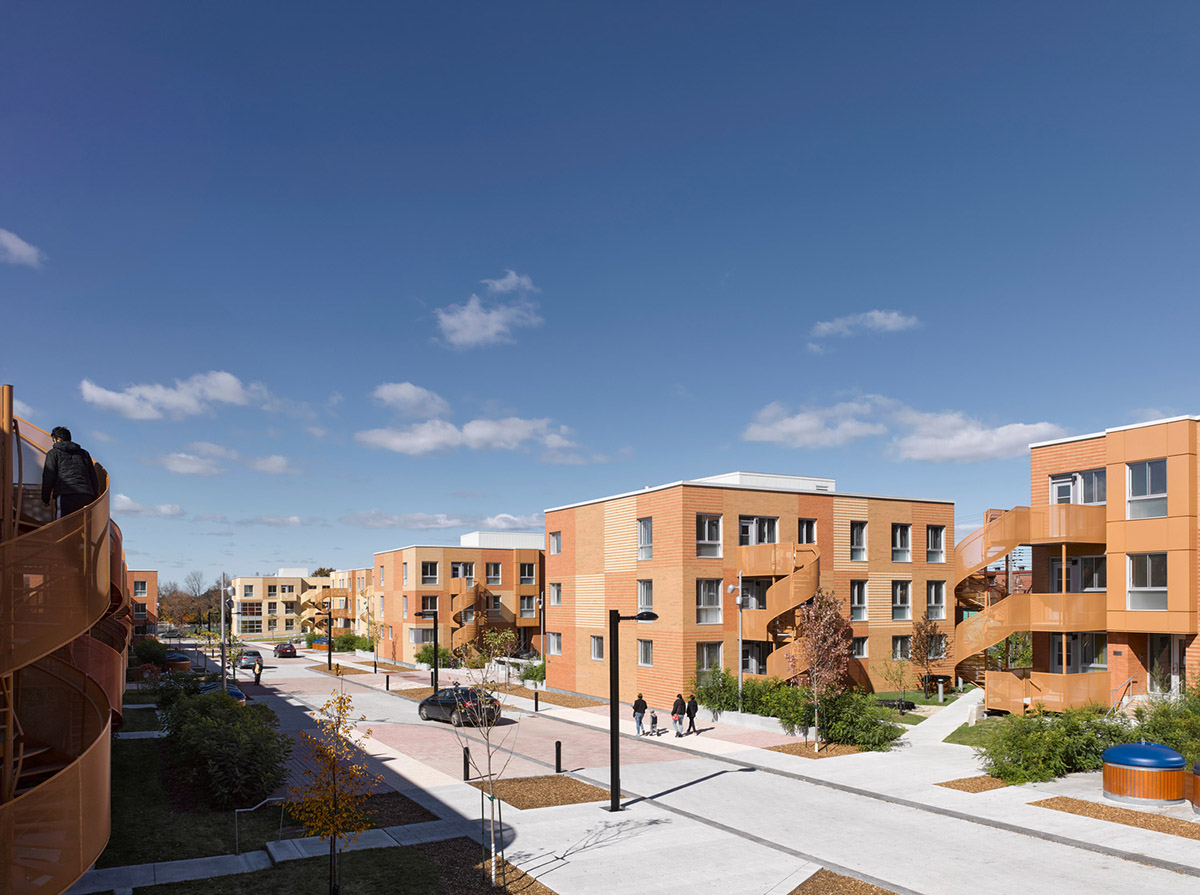 Saia Barbarese Topouzanov renovates 1970s housing complex with spiral staircases in Montréal