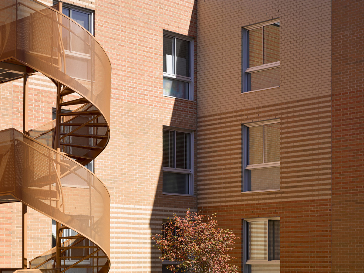Saia Barbarese Topouzanov renovates 1970s housing complex with spiral staircases in Montréal