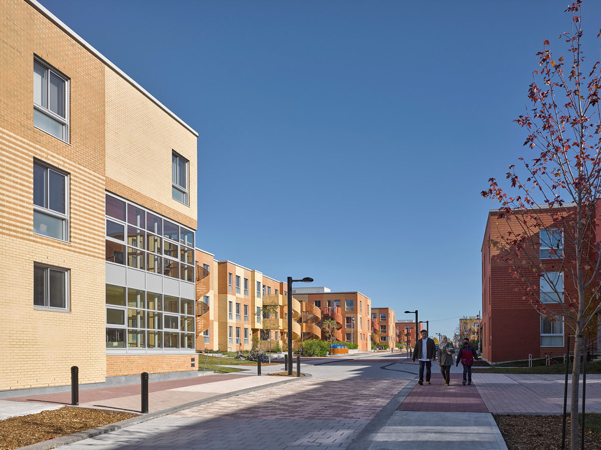 Saia Barbarese Topouzanov renovates 1970s housing complex with spiral staircases in Montréal