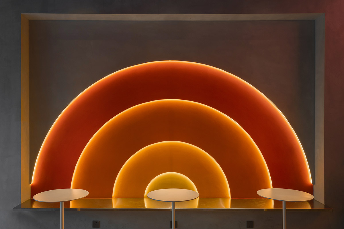 Wutopia Lab completes orange-colored vertical micro social complex with light tower in Guangzhou