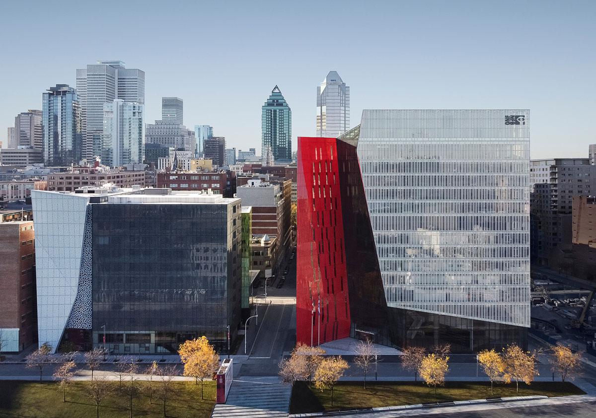 Provencher_Roy carves mixed-use office tower in Montréal with a red-colored diagonal slit