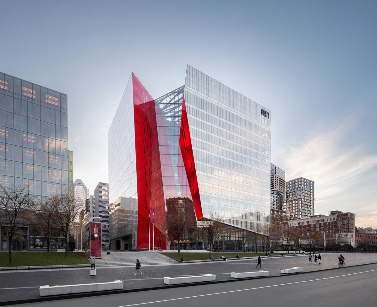 Provencher_Roy carves mixed-use office tower in Montréal with a red-colored diagonal slit
