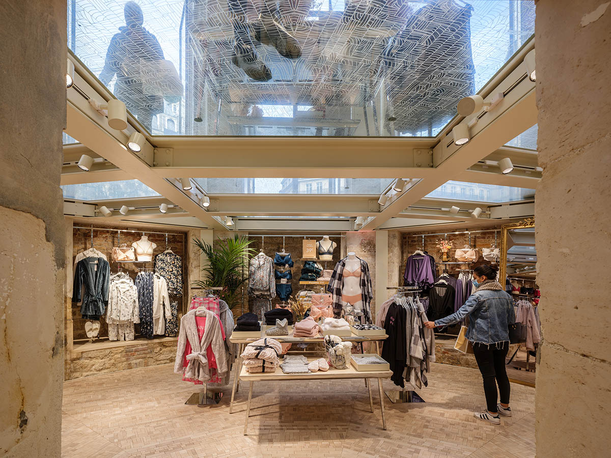 MVRDV renovates 19th-century Haussmann building with glass floor for a lingerie store in Paris