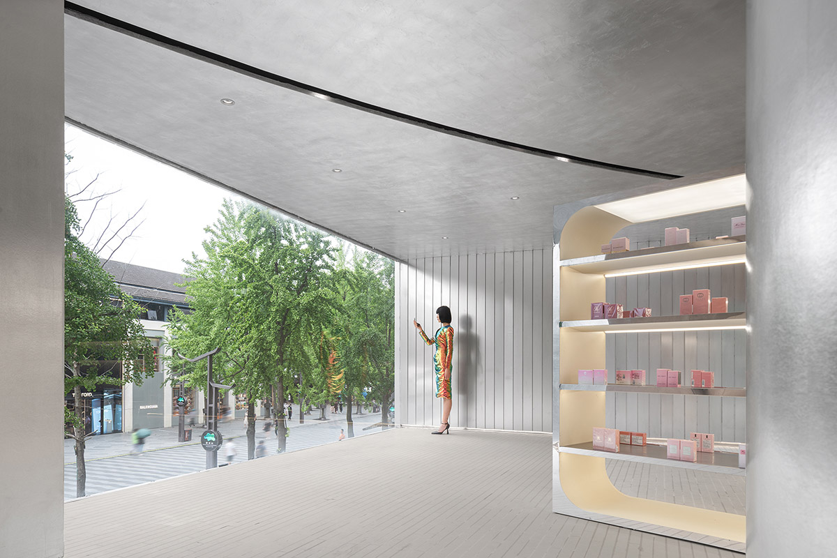 Various Associates designs beauty store with winding staircase and silver-toned interiors in Hangzhou