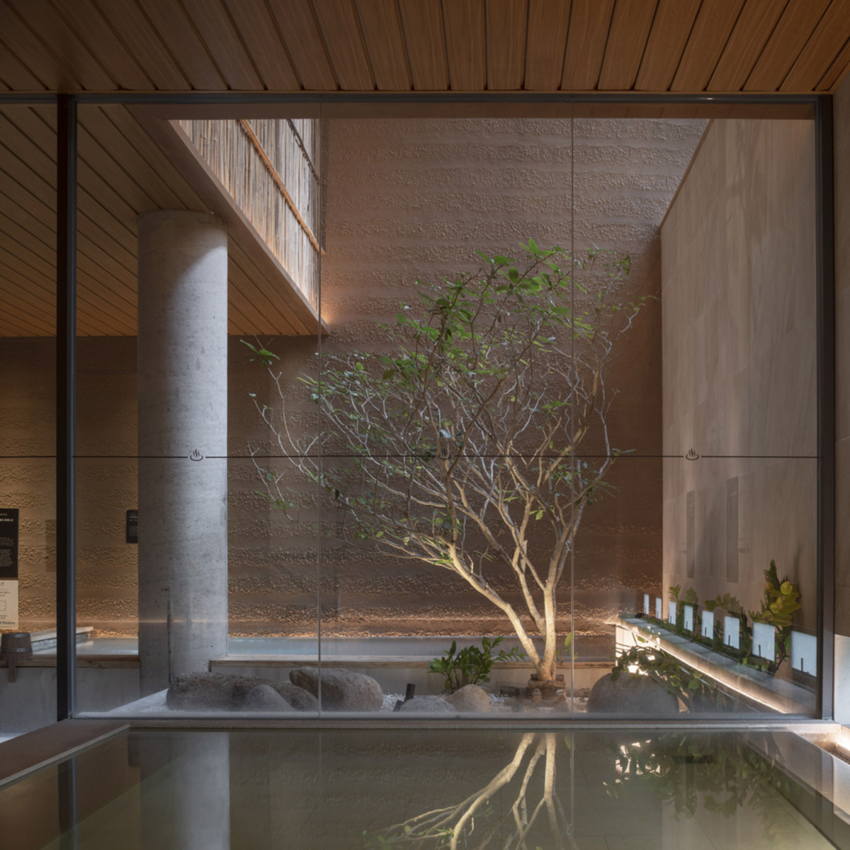 Sixseven Studio creates tranquil interiors for wellness center in Thailand inspired by Japanese art