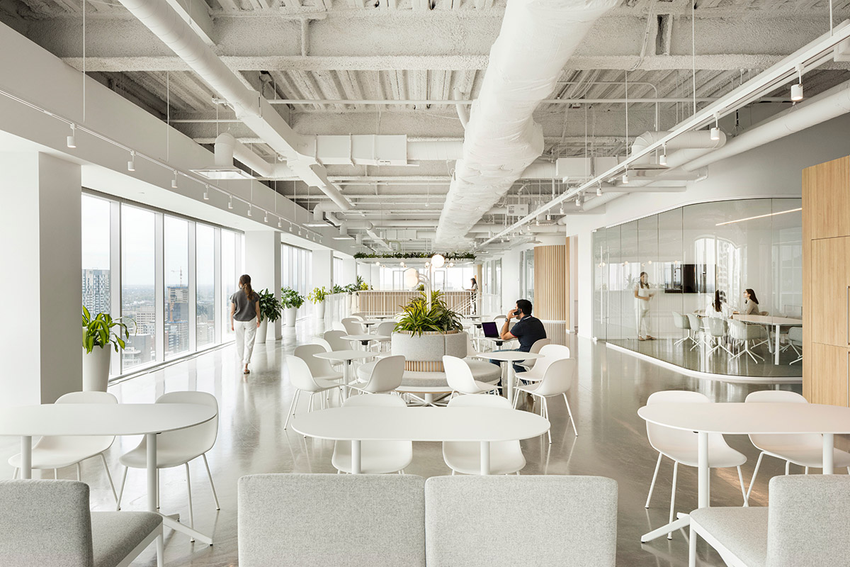 ISSADESIGN merges linear elements and curved working pods for interiors of Behavox in Montreal
