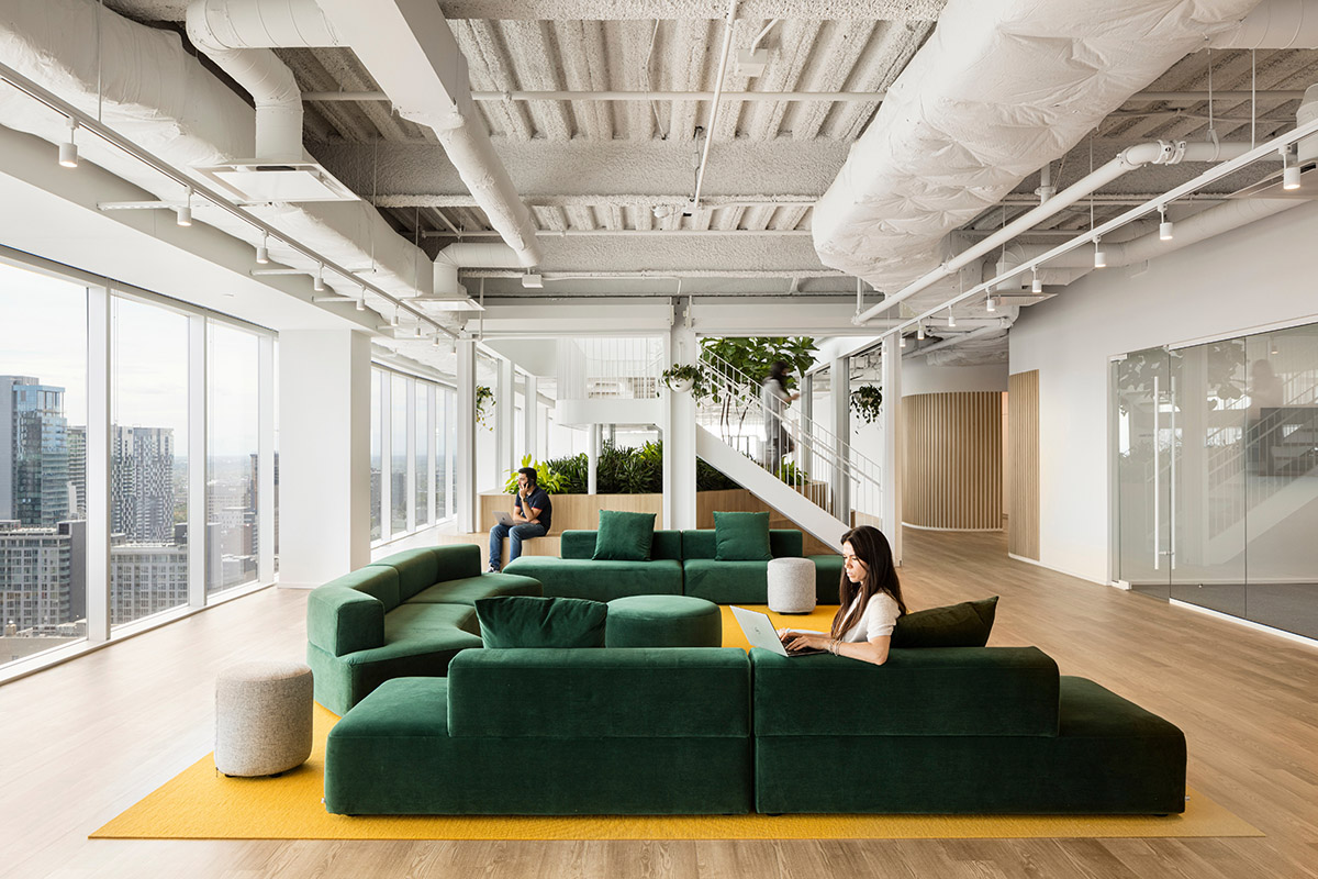 ISSADESIGN merges linear elements and curved working pods for interiors of Behavox in Montreal