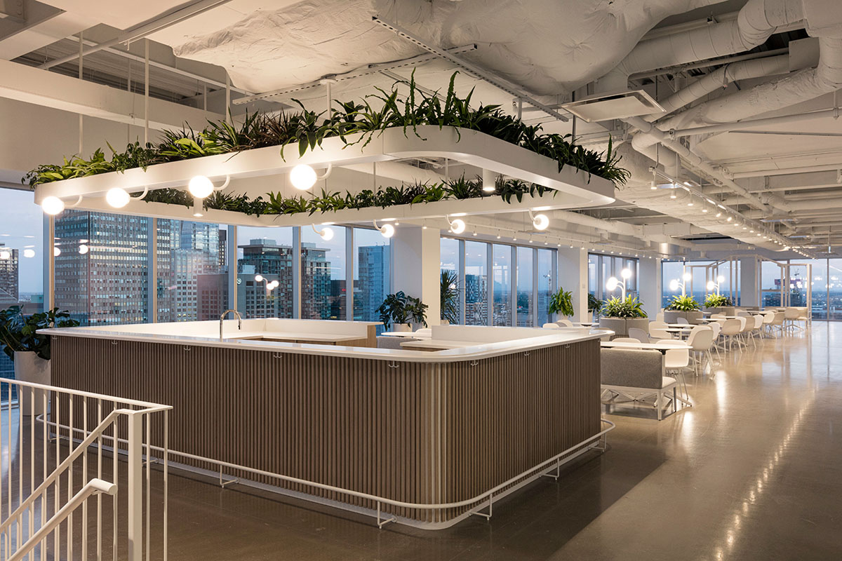 ISSADESIGN merges linear elements and curved working pods for interiors of Behavox in Montreal