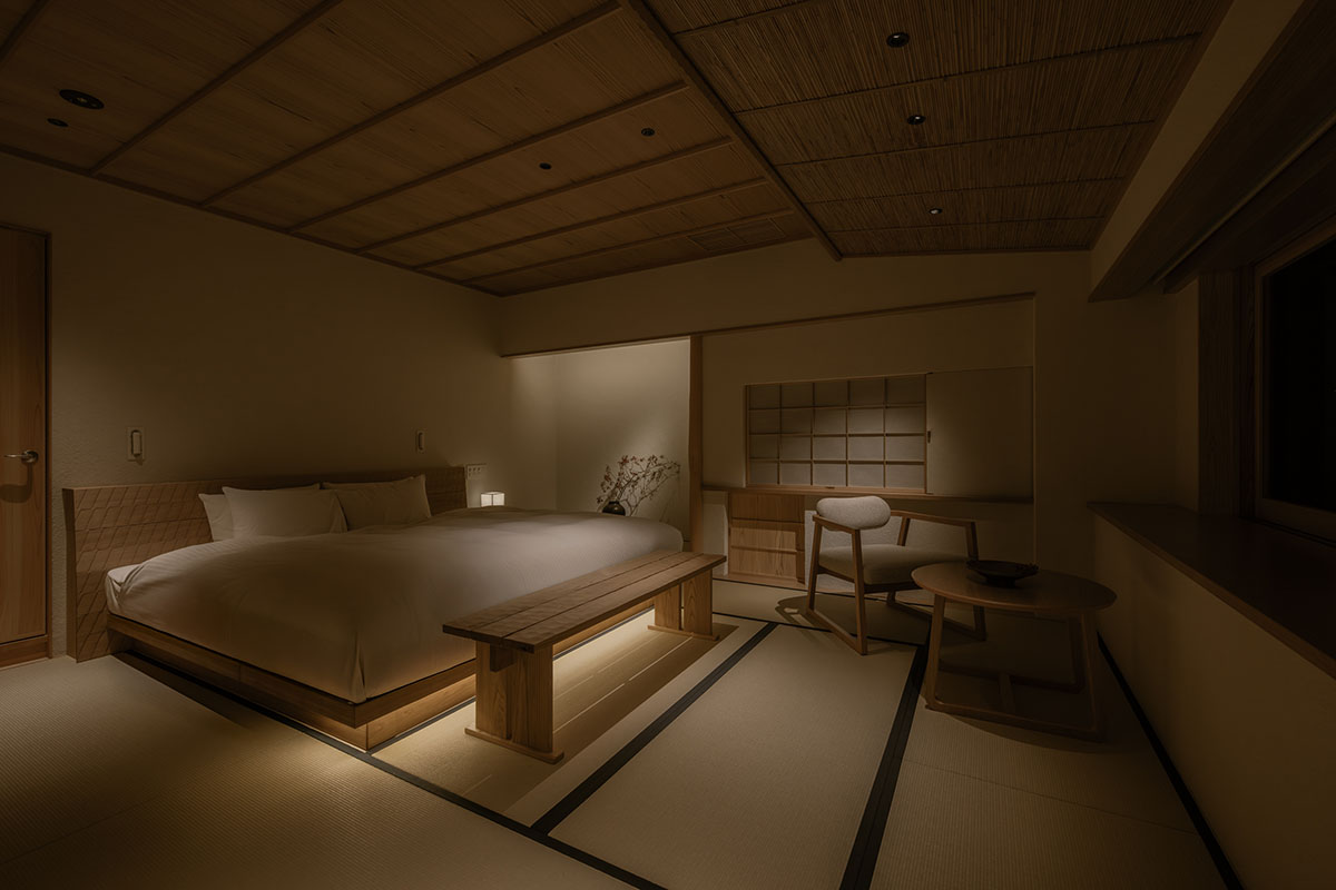kooo architects creates a wooden interior sanctuary for contemporary accommodation in Kyoto City