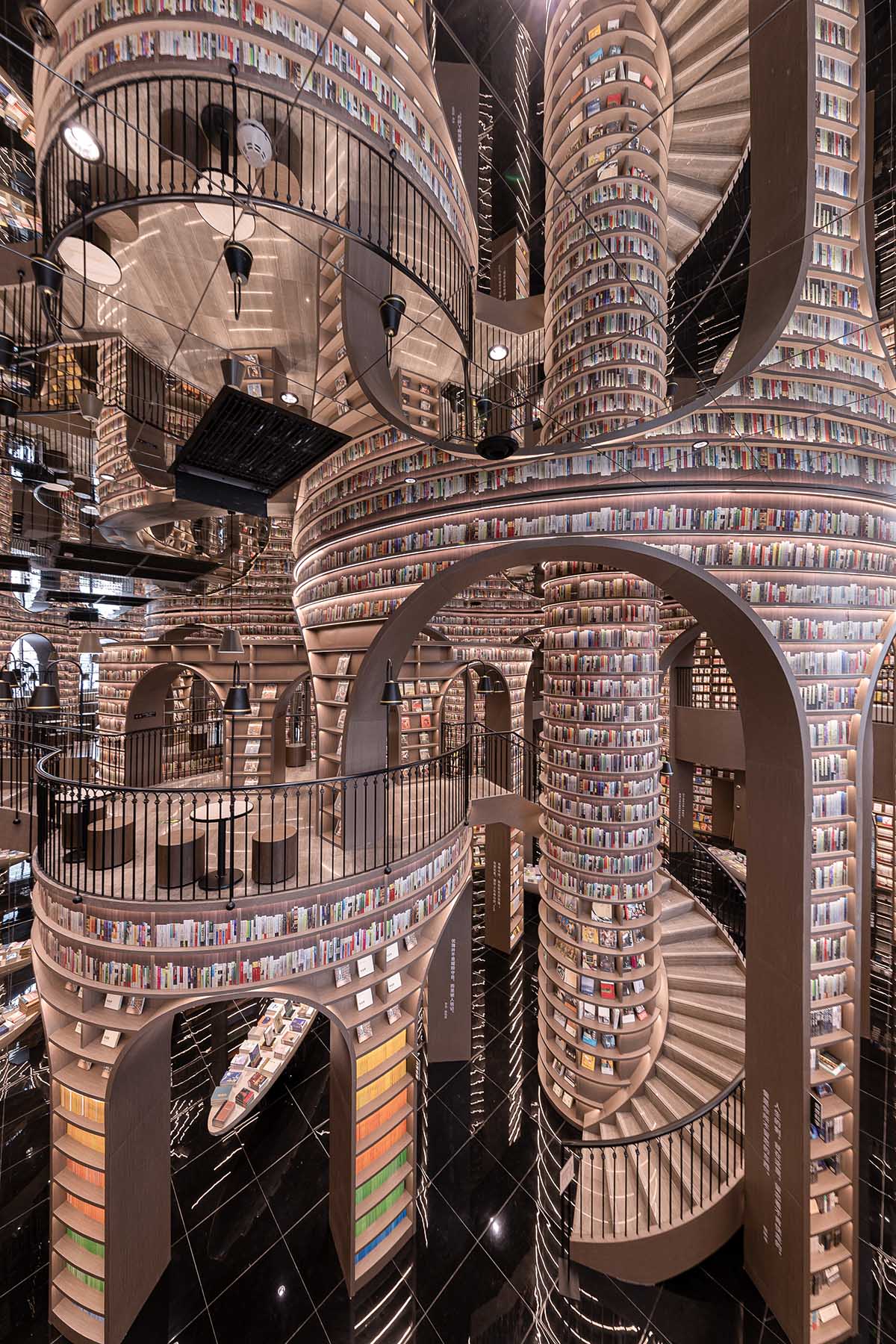 Reading a book is like stepping into a bamboo forest made of endless bookshelves designed by X+Living