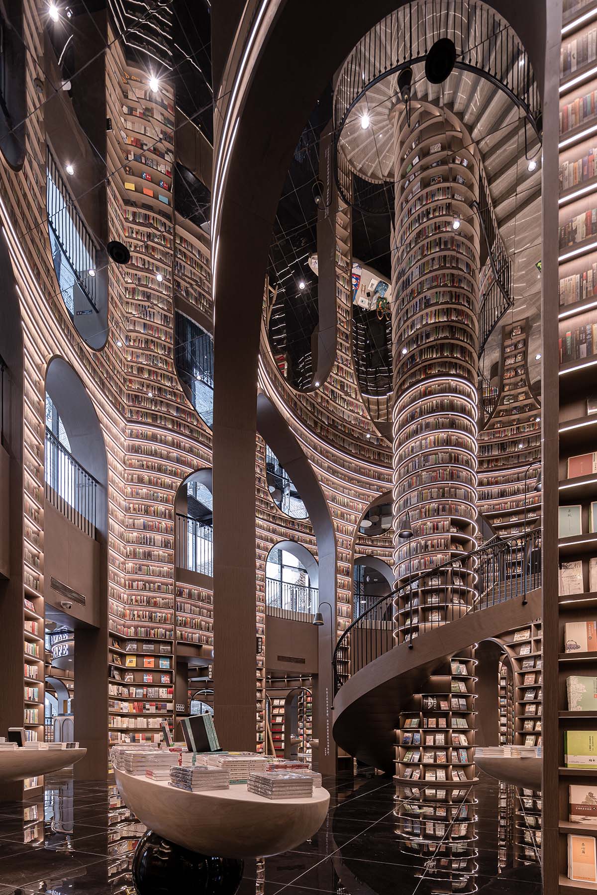 Reading a book is like stepping into a bamboo forest made of endless bookshelves designed by X+Living