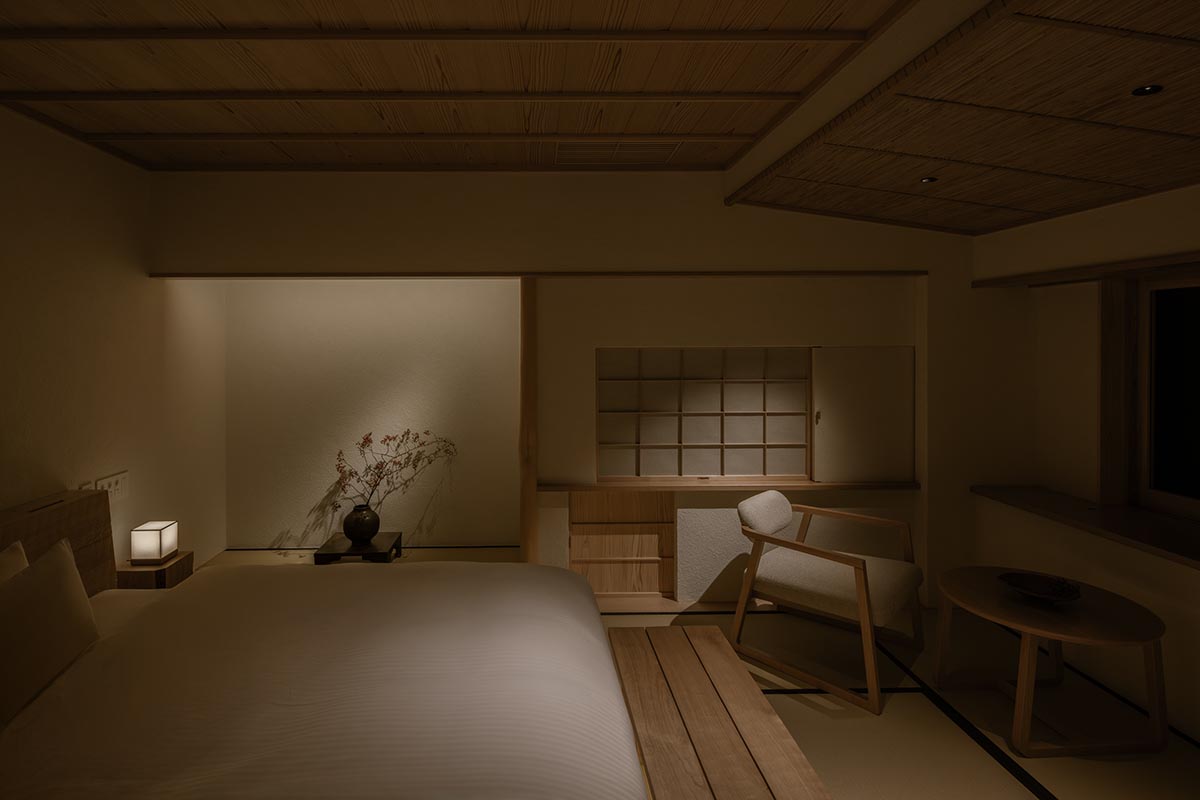 kooo architects creates a wooden interior sanctuary for contemporary accommodation in Kyoto City