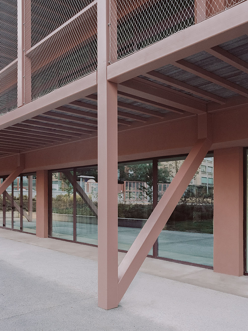 BDR bureau completes community school with pinkish steel framework in Turin