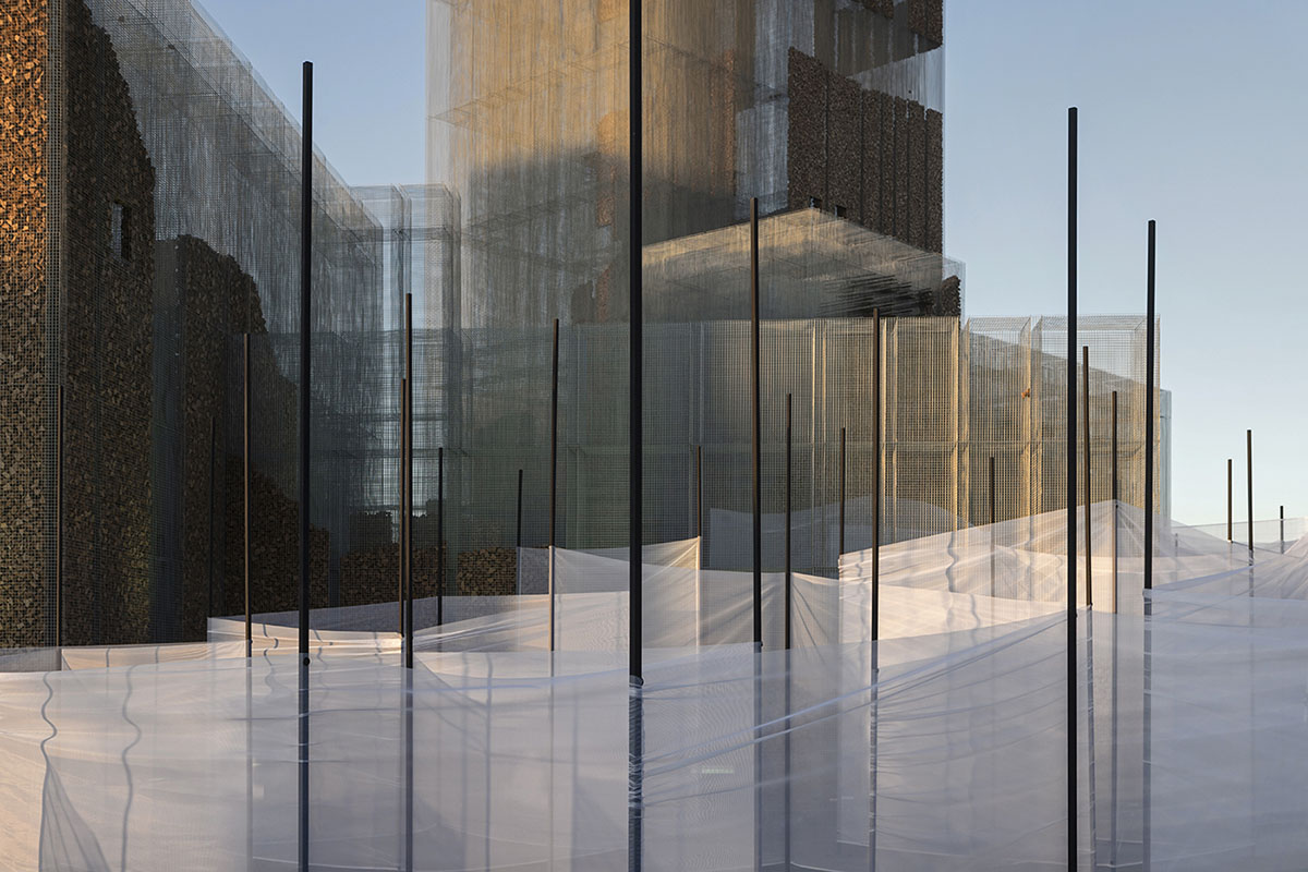 Studio Studio Studio combines wire mesh with cork for this experiential pavilion in Riyadh