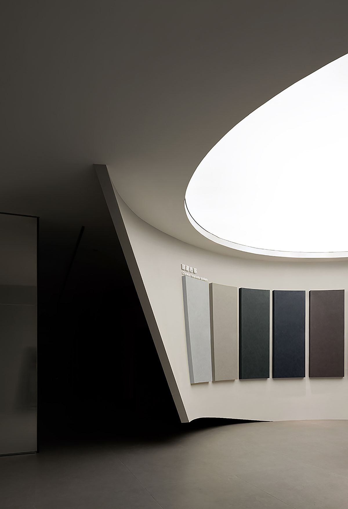 Exhibition hall interiors in China feature unconstrained flowing wall evoking