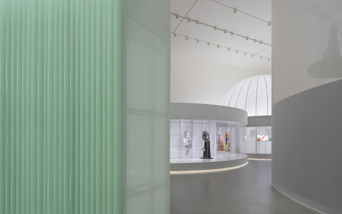 Studio 10 designs exhibition space with white tubular structures and black translucent ramps in China