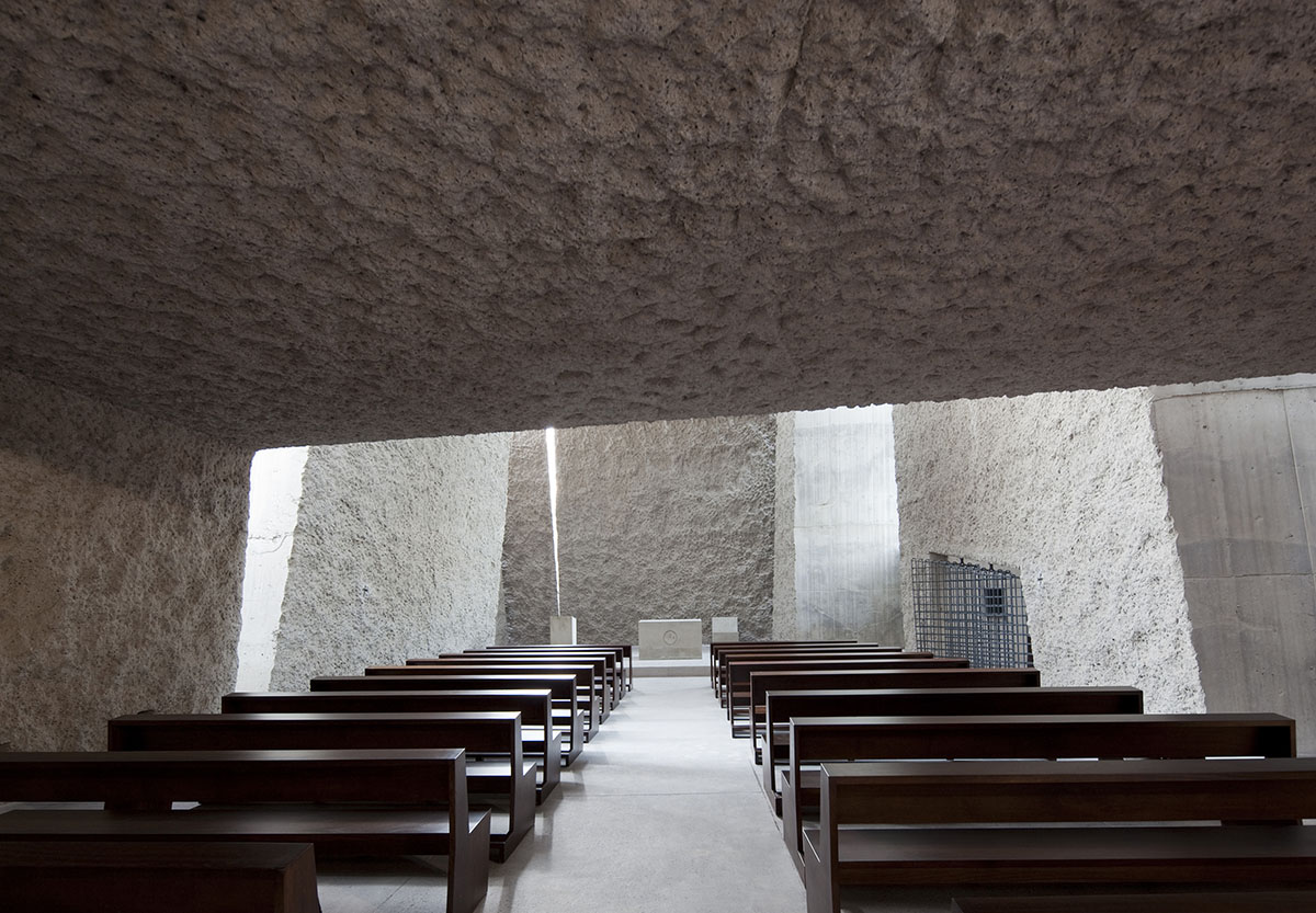 Menis Arquitectos designs church and community centre in Spain with four massive concrete volumes 