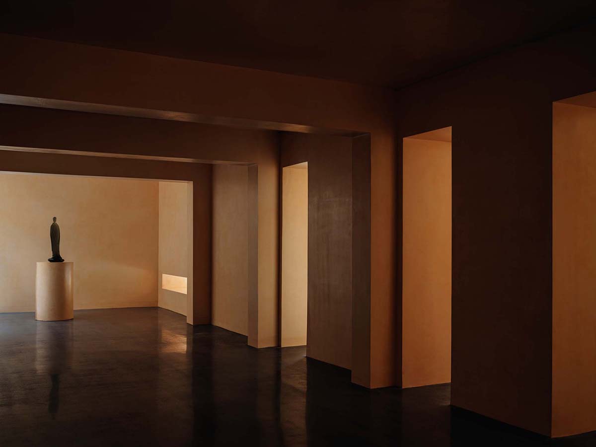 Ladder-Like sandalwood yellow volumes form Buddha artist's exhibition space and studio in China