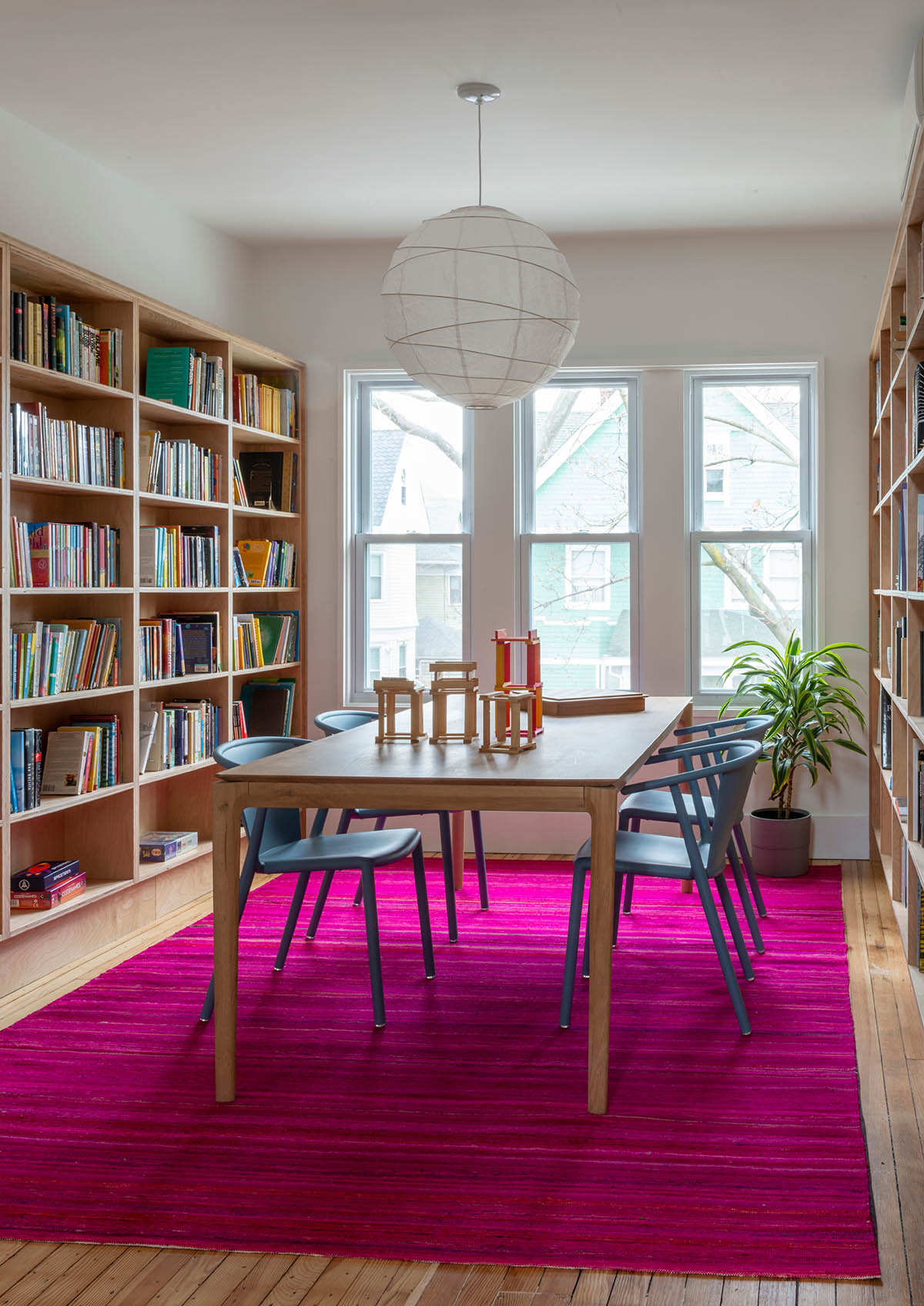 An attic for Ditmas House features colorful interiors designed by Shakespeare Gordon Studio