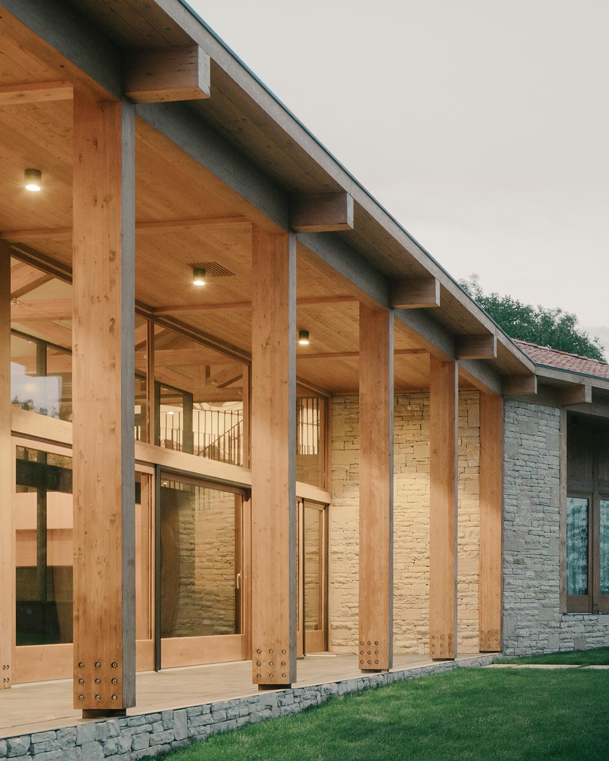 The stone and wood Tbilisi residence integrates architecture with the natural landscape