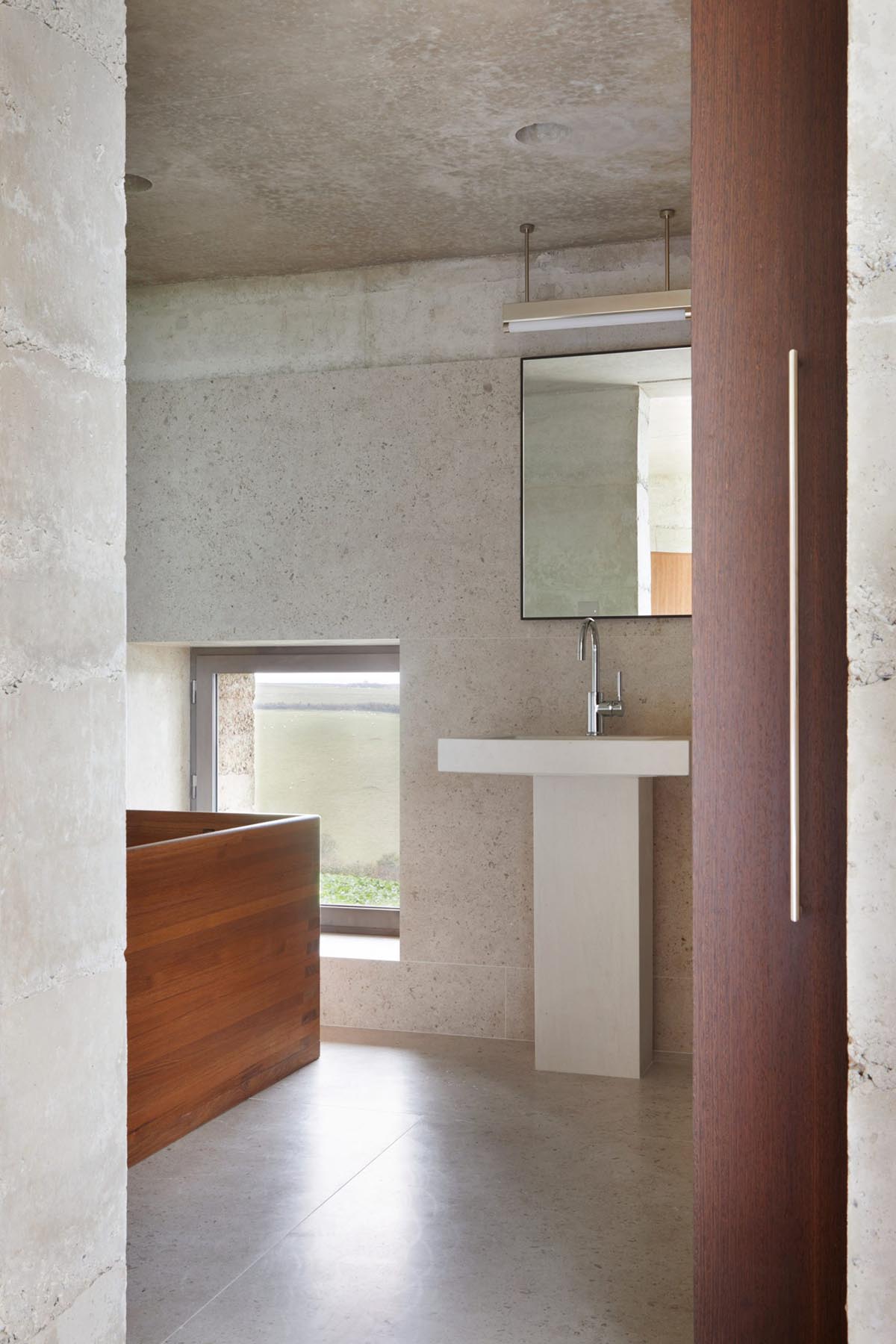 Peter Zumthor completes family home with layered concrete on a hilltop of South Devon